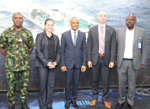 L-R: Commander, Maritime Guard Command, Nigerian Maritime Administration and Safety Agency, NIMASA, Commodore AA Gaya; leader of the delegation from the United States Coast Guard Lt. Cdr. Jonna L. Clouse; Director General, NIMASA, Dr. Bashir Jamoh, OFR; Cdr. James Cepa; Jordan Lachance, Political/Economic Officer, United States Consulate General, Lagos and Head, ISPS Unit, NIMASA, Mr. Isa Mudi. During a visit to the headquarters of NIMASA by the team from USCG and assessment of some Ports facilities in Nigeria.